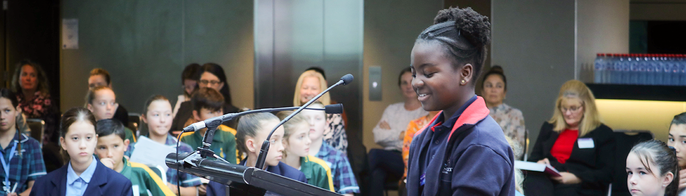 Student giving speech at Youth Parliament